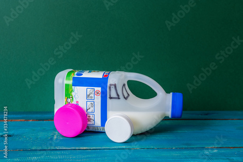 Obraz na płótnie DIY paper milk bag. Creative paper milk bag ideas. Recycle crafts. toy car made from a milk bag w salonie