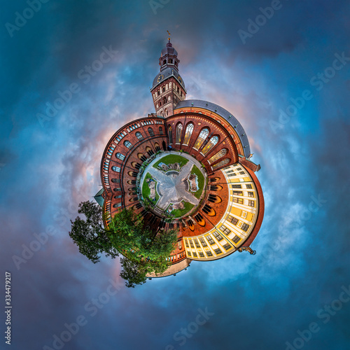 Tiny planet of Riga Dome cathedral inner courtyard during sunset time