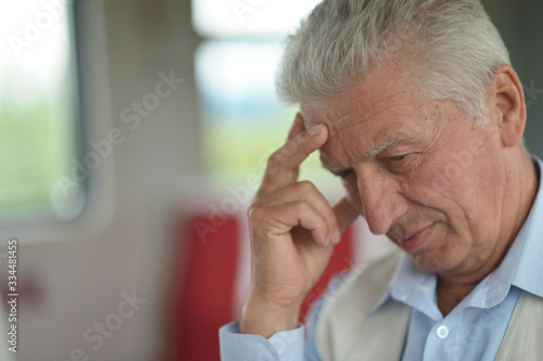 Close up portrait of thoughtful senior man