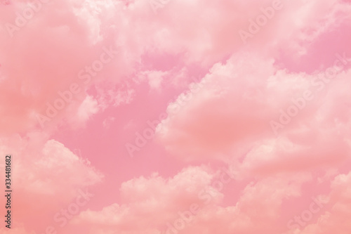 Beautiful sky and clouds in soft pastel color.Soft pink cloud in the sky background colorful pastel tone.