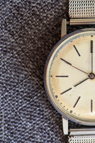 Wallpaper Mural men's chrome watch on fabric background Torontodigital.ca