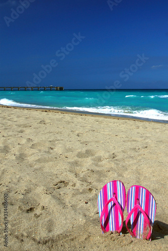 Hot Pink Flip Flops on the Beach