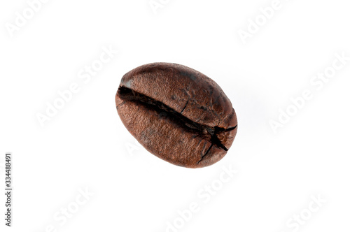 Close up roasted coffee beans on isolated white background