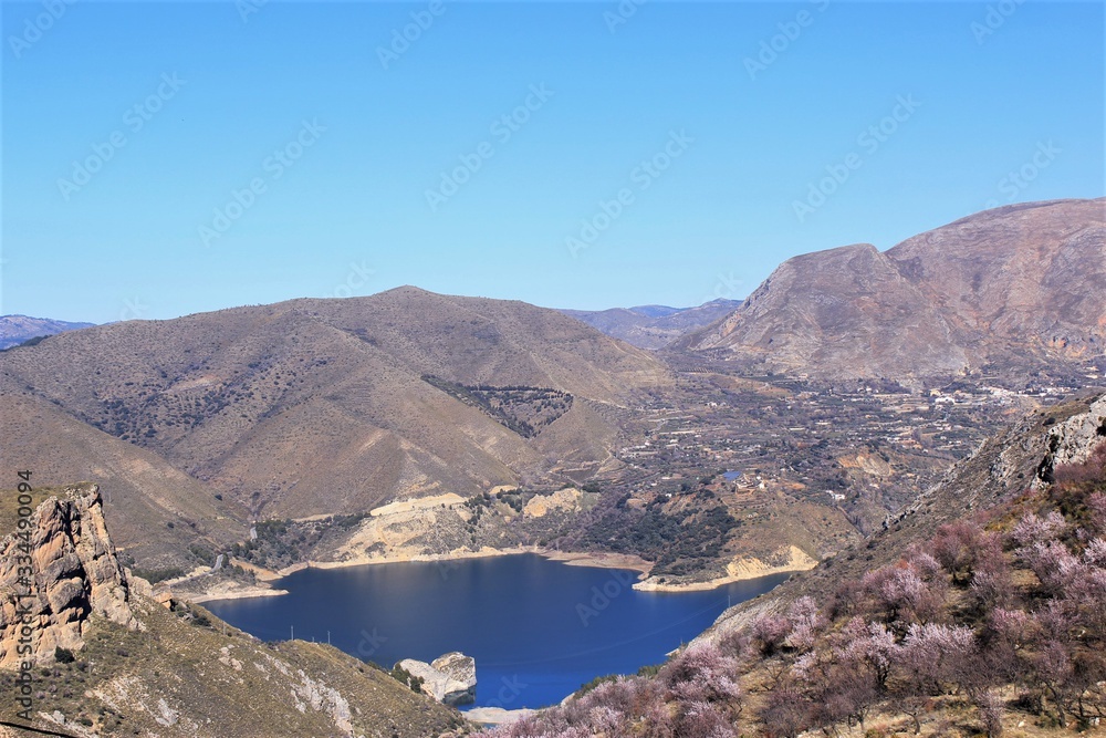 Lake in the hills amazing landscape at Granada,Spain. photo Lake in the hills amazing landscape at Granada,Spain. photo