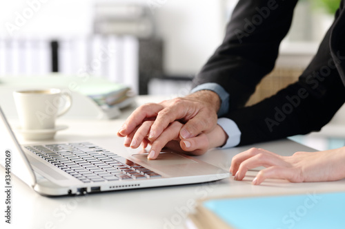 Worker hands harassed by manager at the office