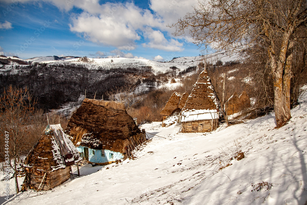 
Inhabited old house in the Apuseni Mountains in winter, Romania