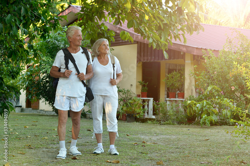 Portrait of elderly couple of tourists. Travel