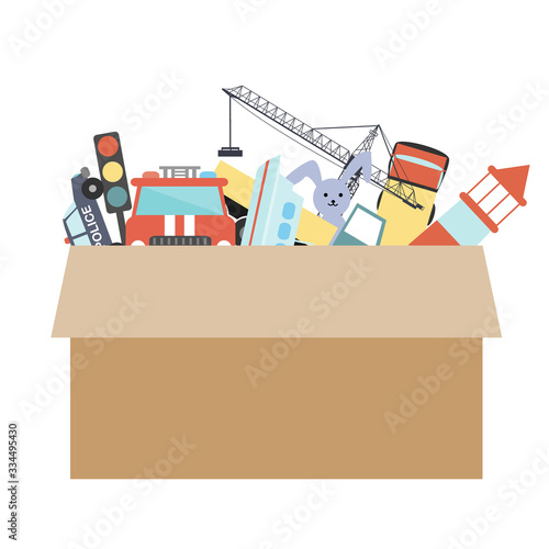 Cardboard box with kids toys on a white background. Vector illustration. Room organization or charity concept