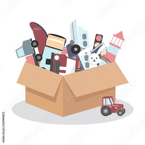 Cardboard box with kids toys on a white background. Vector illustration. Room organization or charity concept