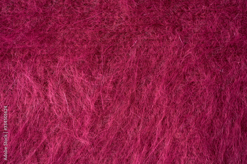 Fototapeta premium Closeup red texture of woolen knitted fabric. Pattern of red fabric.