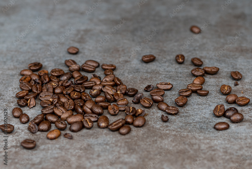 Coffee beans on grey background Coffee beans on grey background