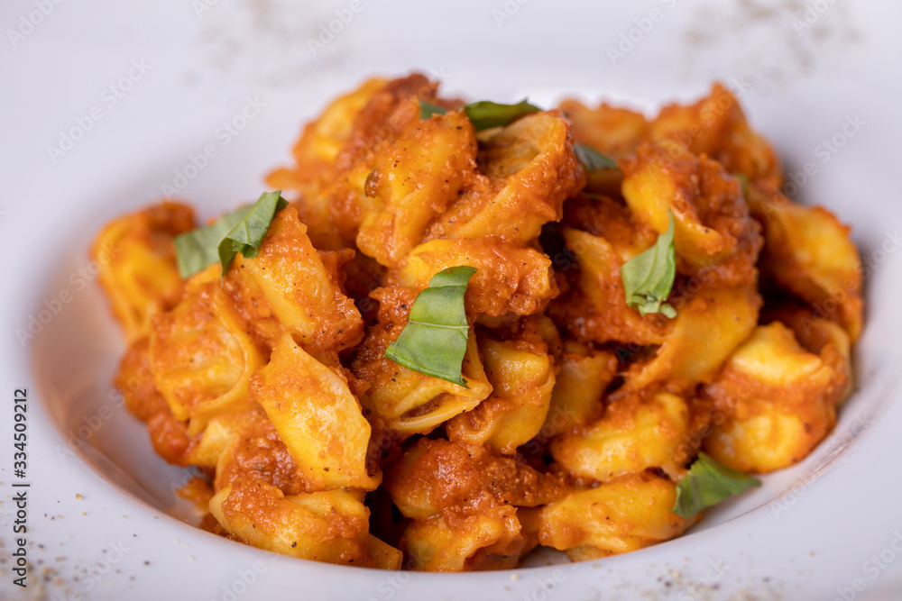 details of tasty fresh tortellini bolognese