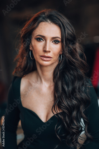 Wallpaper Mural portrait of a beautiful woman in a black dress Torontodigital.ca