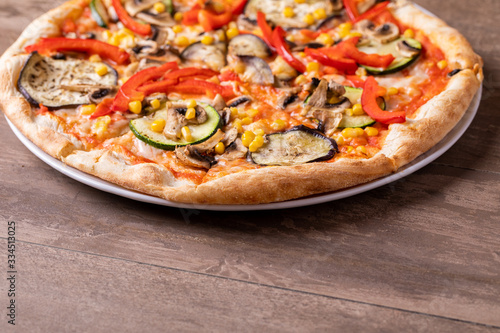 details of vegetarian pizza on a plate