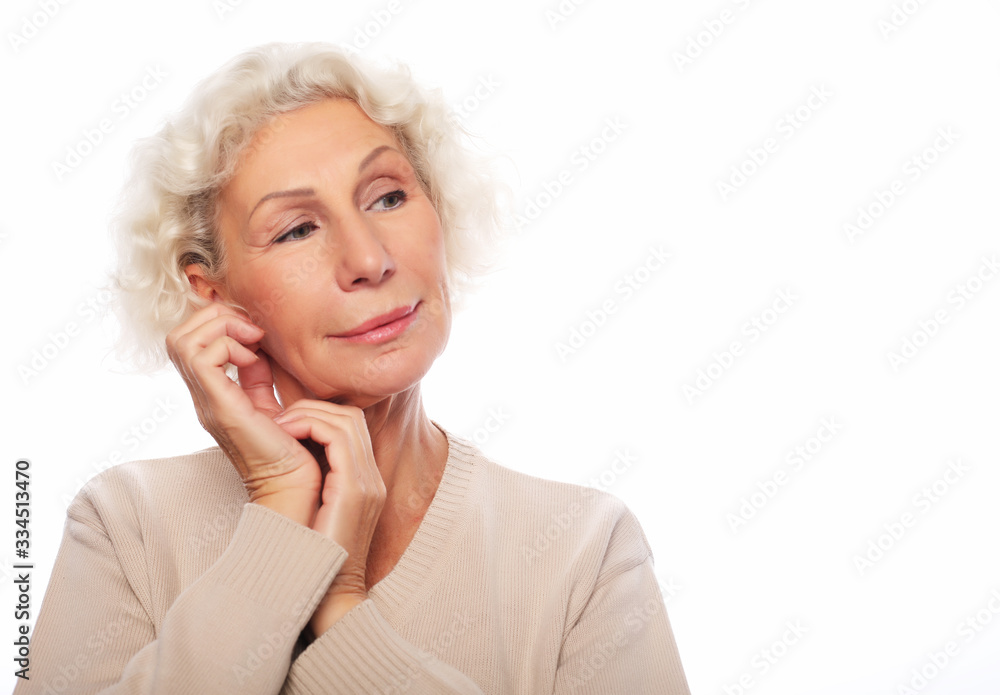 lifestyle, emotion and people concept: Grey haired old nice beautiful woman. Isolated over white background.