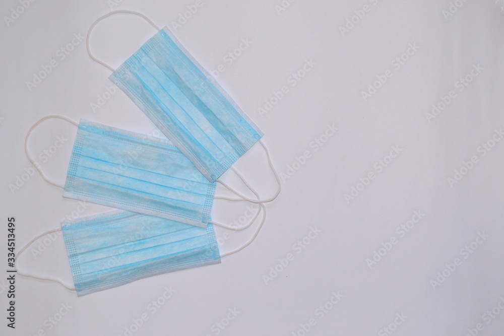 blue masks on white background with space for text blue masks on white background with space for text