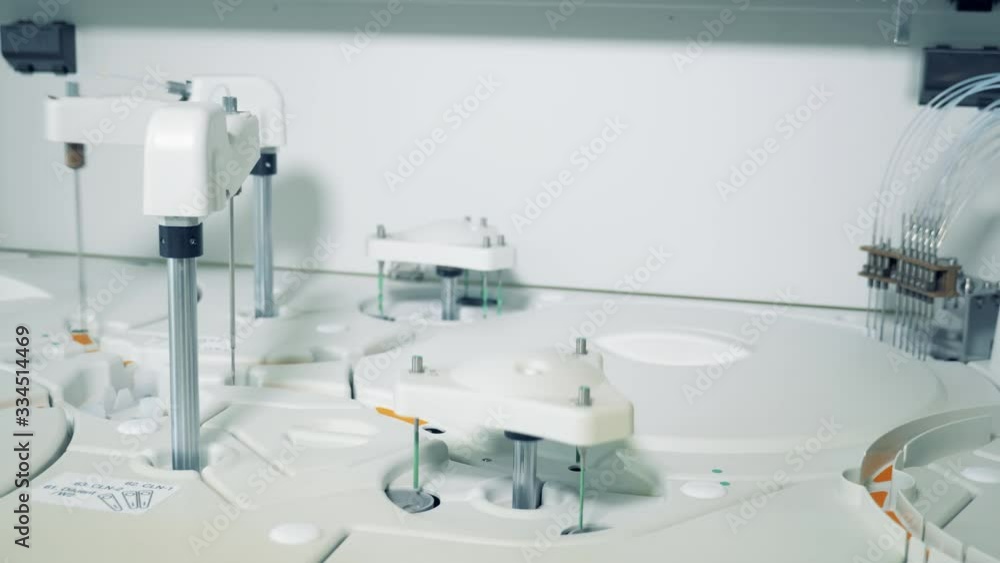 Fast motion of a biochemical analyzing machine at work Fast motion of a biochemical analyzing machine at work