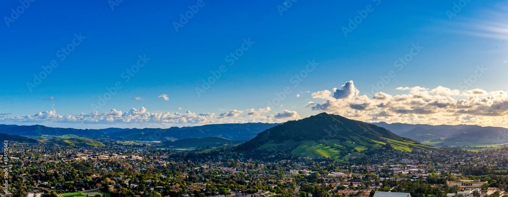 Panoramic View of Mountain, City, in afternoon light
