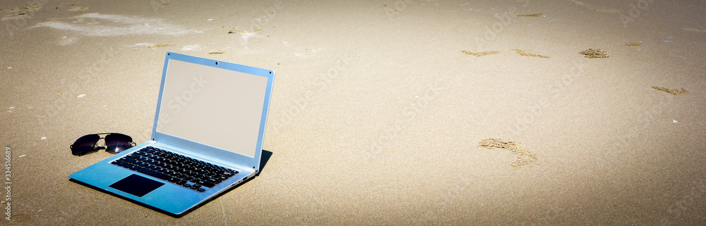 custom made wallpaper toronto digitallaptop computer on the beach is decorated in vintage style.