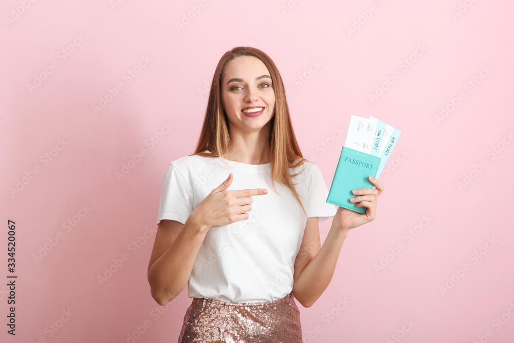 Beautiful young smiling girl holds tickets for travel. Rest, travel, tour. Beautiful young smiling girl holds tickets for travel. Rest, travel, tour.
