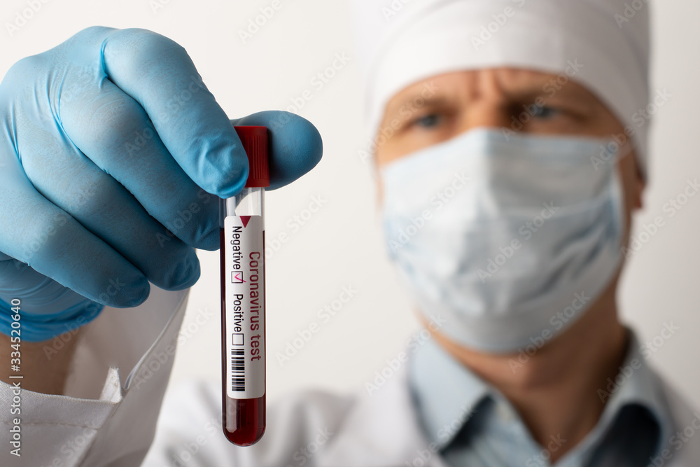 Doctor holds coronavirus blood sample. Negative coronavirus test shows that the person is not infected with dangerous virus Doctor holds coronavirus blood sample. Negative coronavirus test shows that the person is not infected with dangerous virus