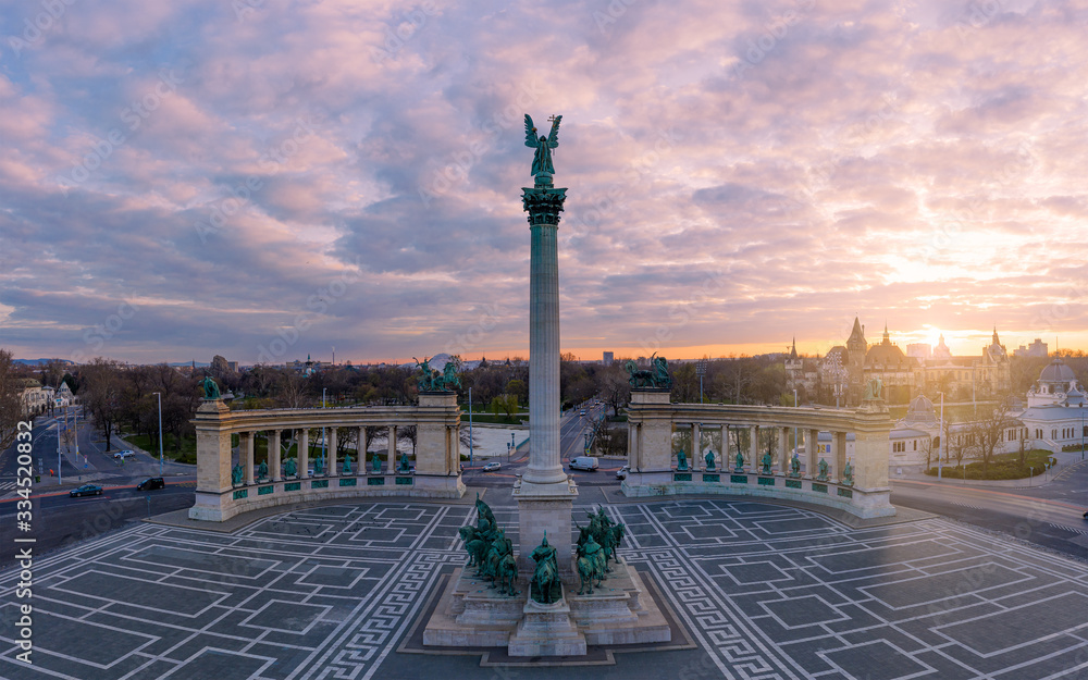 Europe Hungary Budapest Heroes square.  Sunrise. Millenium monuments. Gabriel  ark angel. Empty. covid-19