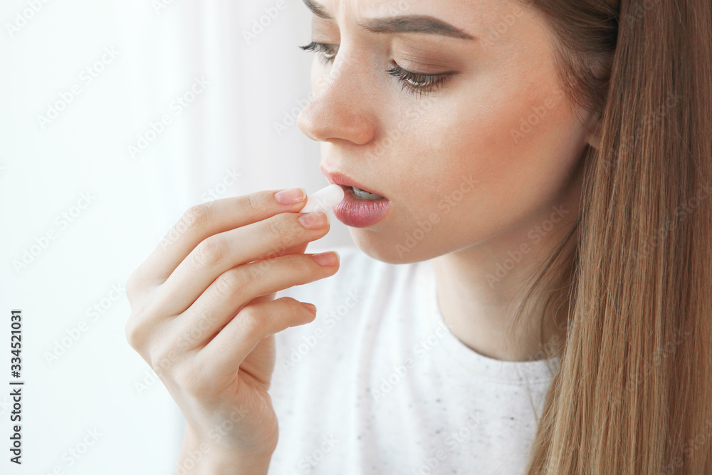 Girl takes pills. Health care, nutritional supplements, pain pills Girl takes pills. Health care, nutritional supplements, pain pills