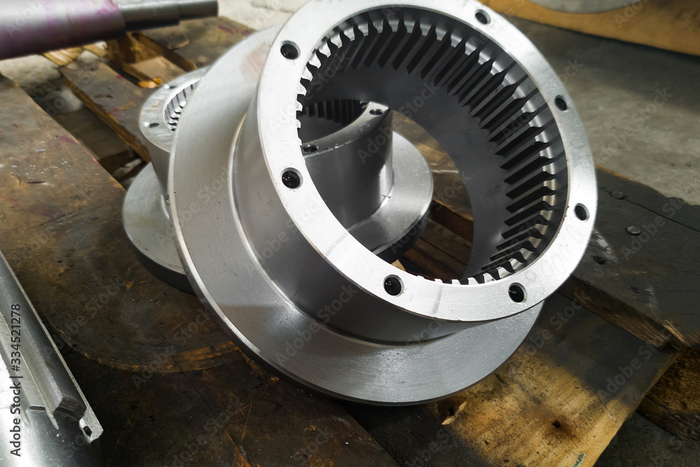 Round gears after turning and milling on the rack closeup. Round gears after turning and milling on the rack closeup.