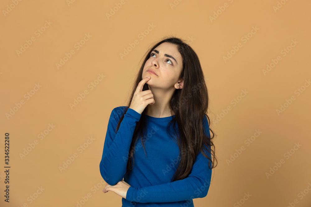 Brunette young girl wearing blue jersey Brunette young girl wearing blue jersey
