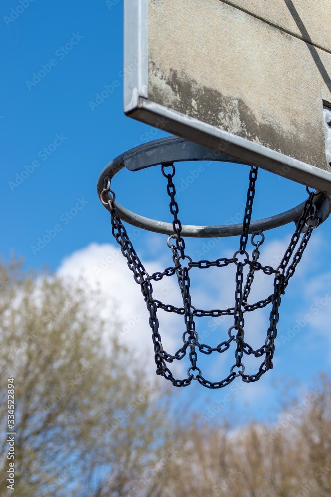 basketball hoop against blue sky basketball hoop against blue sky
