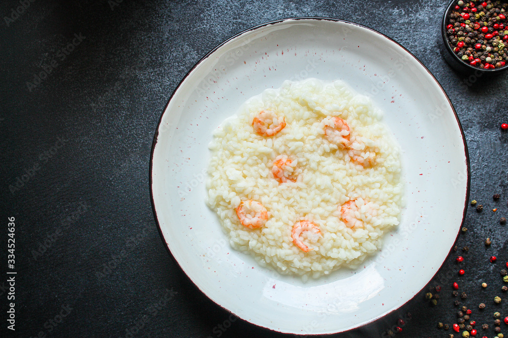 risotto shrimp prawn seafood rice Menu concept. food background. top view copy space for text keto or paleo diets