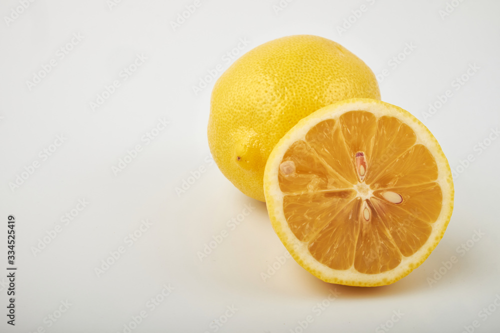 Ginger bio and lemon on white background.