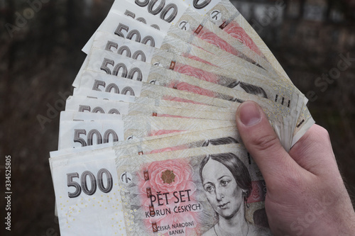 Czech money called Czech Crown in Czechia , one hundreds, two hundreds, five hundreds, one thousand, two thousand