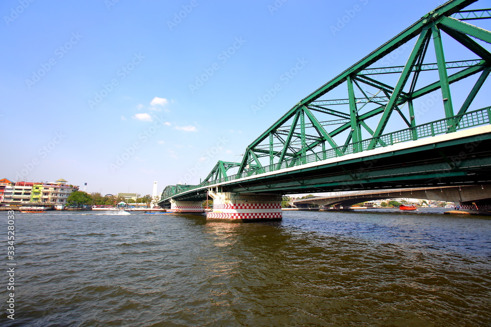 A beautiful old green bridge with steel structures. A beautiful old green bridge with steel structures.