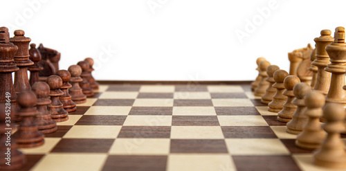 Foto Chess pieces lined up on the chessboard