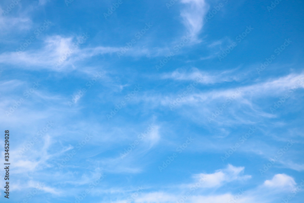 Beautiful white clouds with blue sky, color shade gradient from white to blue for background