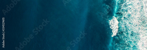 Aerial view to waves in ocean Splashing Waves. Fototapete