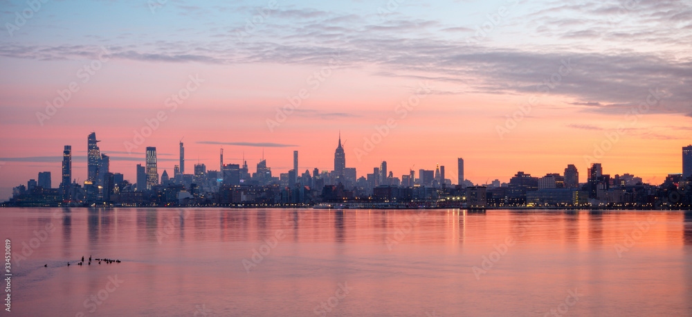 Panoramic view of Midtown Manhattan at sunrise from Harborside Place, Jersey City, New Jersey