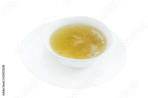 Chicken bouillon with noodles isolated on the white © Dariia