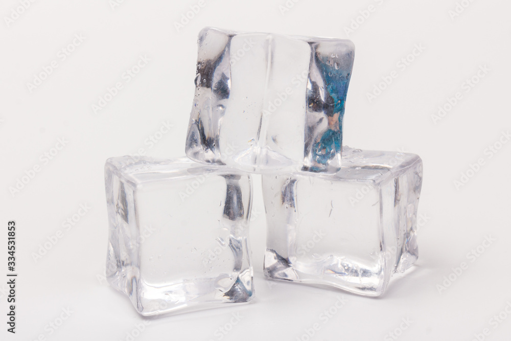 ice cubes in close-up on gray background ice cubes in close-up on gray background