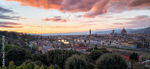 Amazing colorful sunset view of Florence city  Italy with the river Arno and Cathedral of Santa Maria del Fiore.