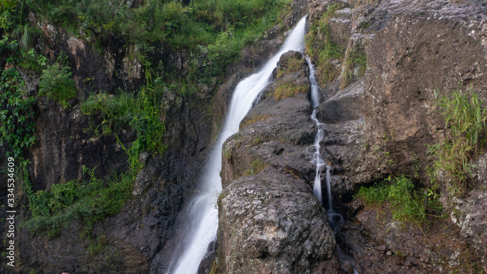 Cliffs with soft waterfalls in the hills Cliffs with soft waterfalls in the hills