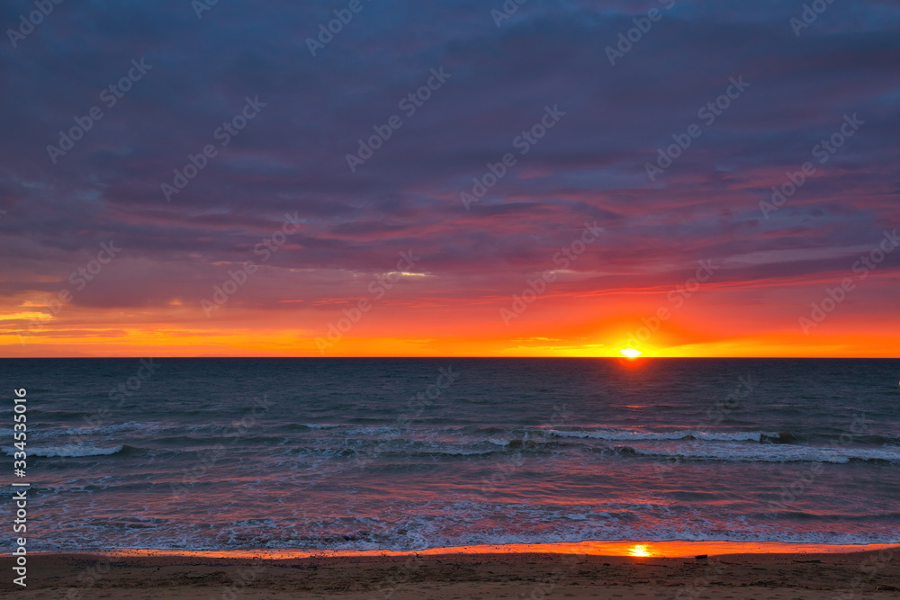 Sunset on the beach of San Vincenzo Tuscany Italy