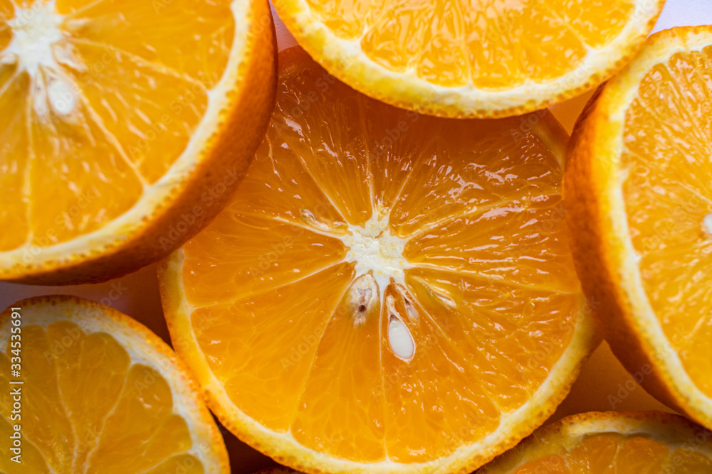 Background with citrus fruit of orange slices. Close-up. Studio photography. Background with citrus fruit of orange slices. Close-up. Studio photography.