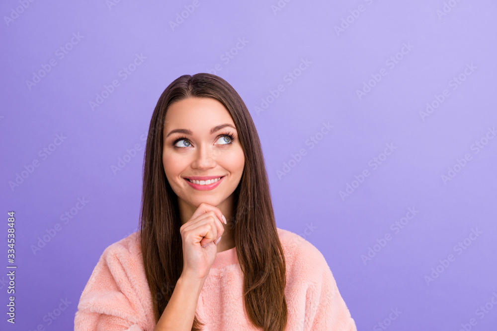 Closeup photo of attractive cute lady looking dreamy empty space imagination flight arm on chin wear casual trendy warm fuzzy fluffy pullover isolated purple color background Closeup photo of attractive cute lady looking dreamy empty space imagination flight arm on chin wear casual trendy warm fuzzy fluffy pullover isolated purple color background