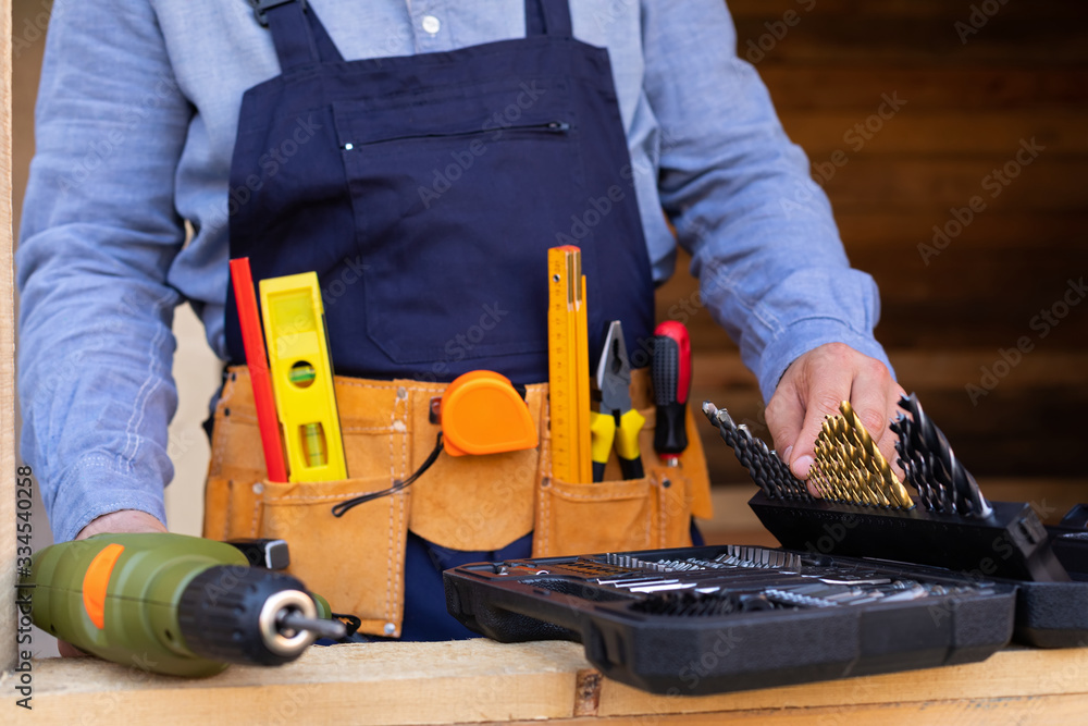 Close up construction tool belt and work instruments Close up construction tool belt and work instruments