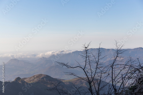 mountain landscape  on the horizon you can see the silhouettes of the mountains with different shades of blue