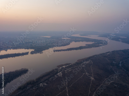 Landscape  blue hour over the Dnieper River in Kiev. Aerial drone view.