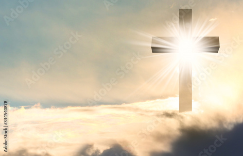 Photography Silhouette of cross against blue sky. Christian religion