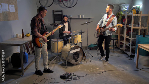 Young musicians in garage have a repetitioon